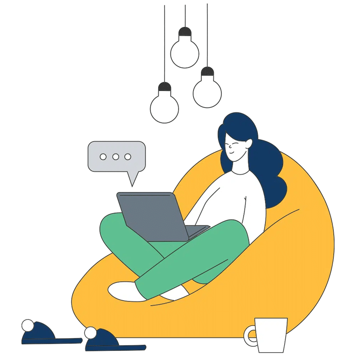 Woman researching diagnostic assessment with Aim Forward sitting down on a bean bag on her laptop